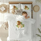 Children's bedding set with lion design and name 'William' in a bedroom setting.