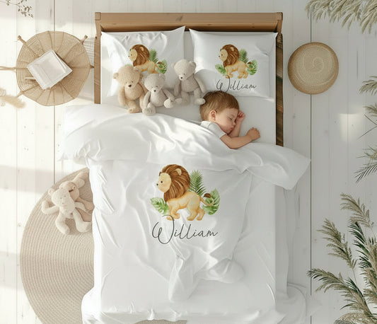 Children's bedding set with lion design and name 'William' in a bedroom setting.